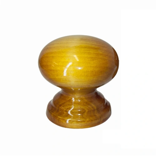 картинка Ручка-кнопка Лиственница лакированная от магазина Румлес